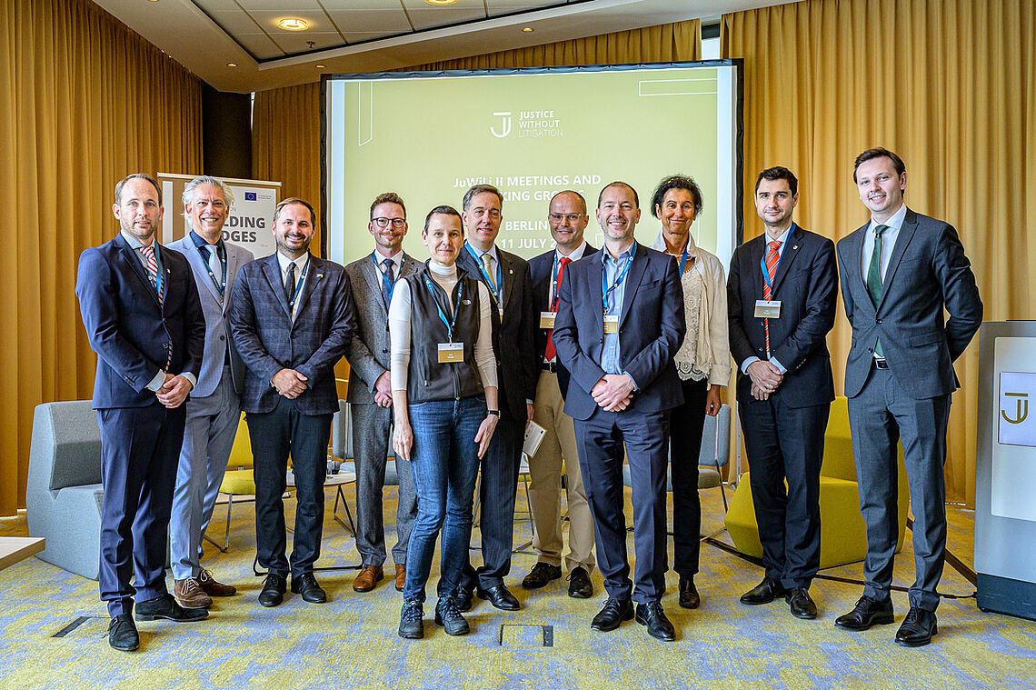 Justice Without Litigation II: Vortragende und Teilnehmer/-innen des Workshops am 11.07.2025 in Berlin